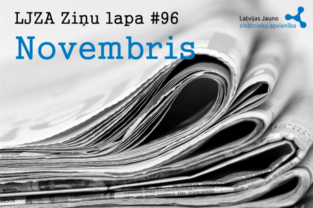 LJZA Novembra ziņu lapas nosaukums uz avīžu kaudzītes fona